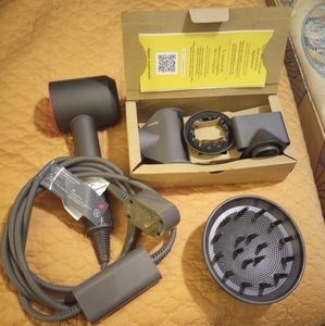 Dyson Supersonic hair dryer like new with attachments